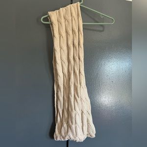 The brand is C.C the color is a cream white, and the size is fits all.